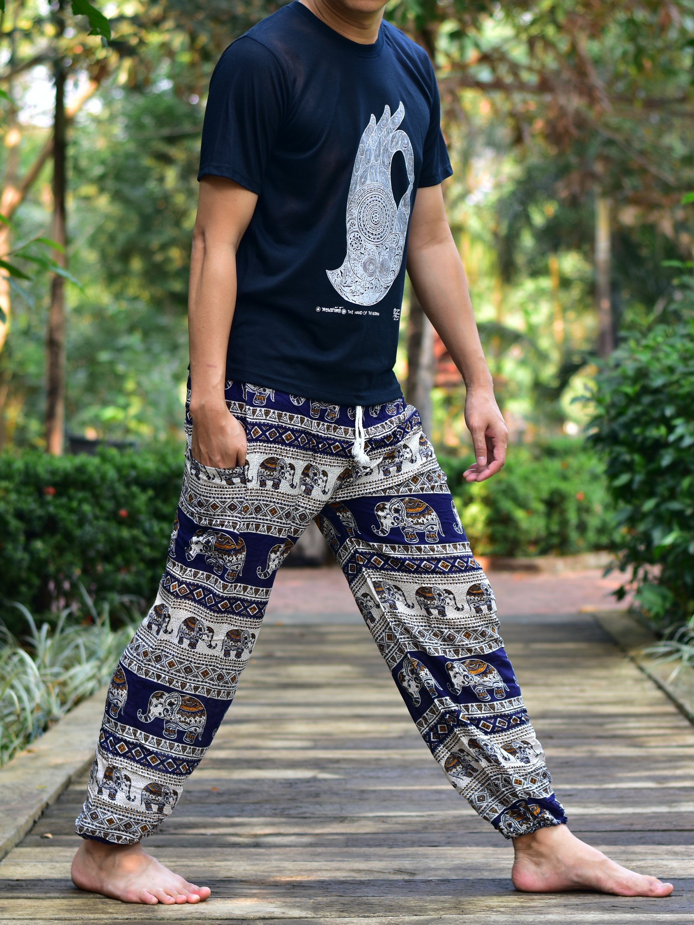 Bohotusk Men's Navy Blue Elephant Savannah Print Harem Pants with elasticated waist and ankles, featuring a unique elephant design.