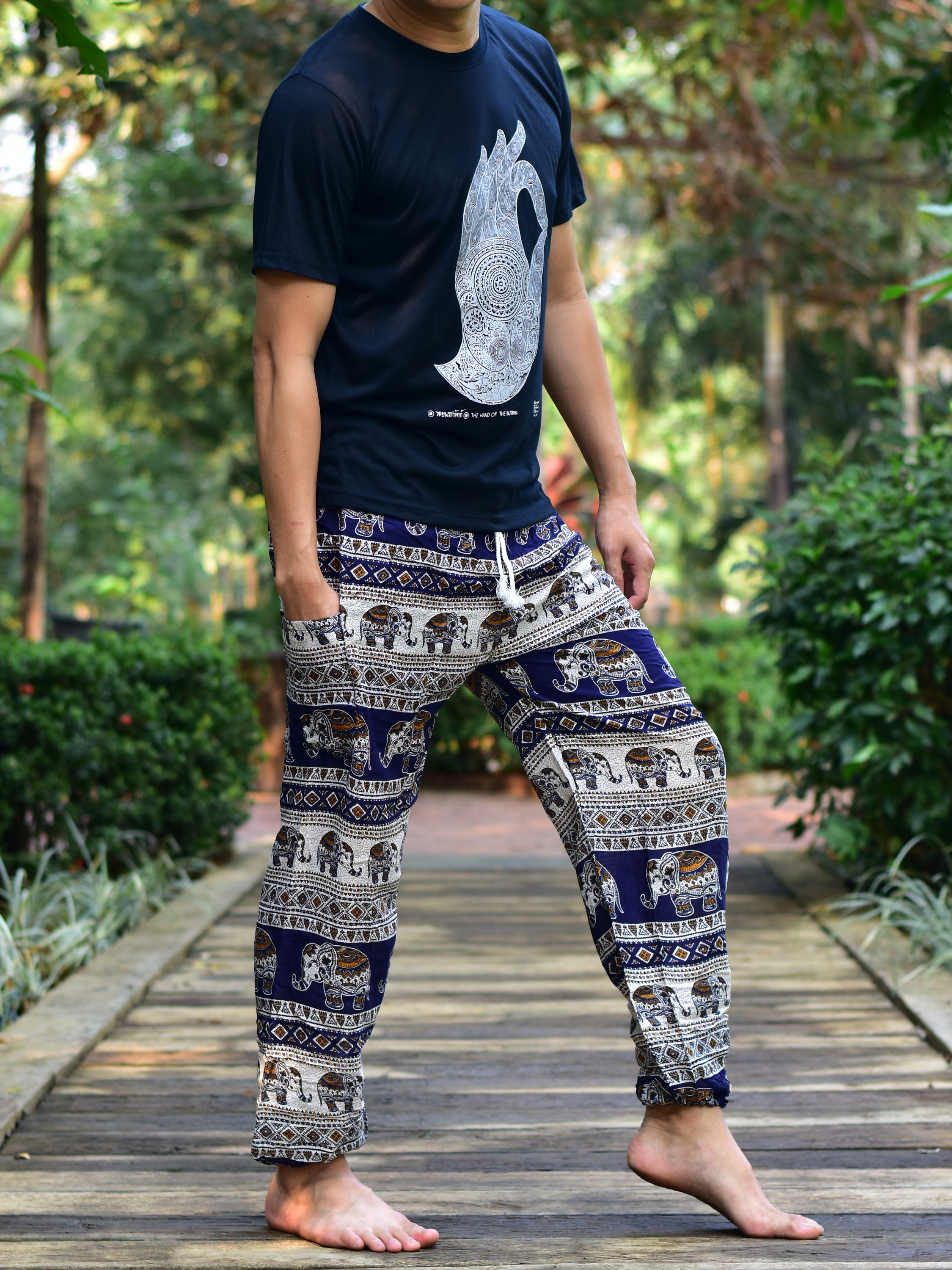 Bohotusk Men's Navy Blue Elephant Savannah Print Harem Pants with elasticated waist and ankles, featuring a unique elephant design.