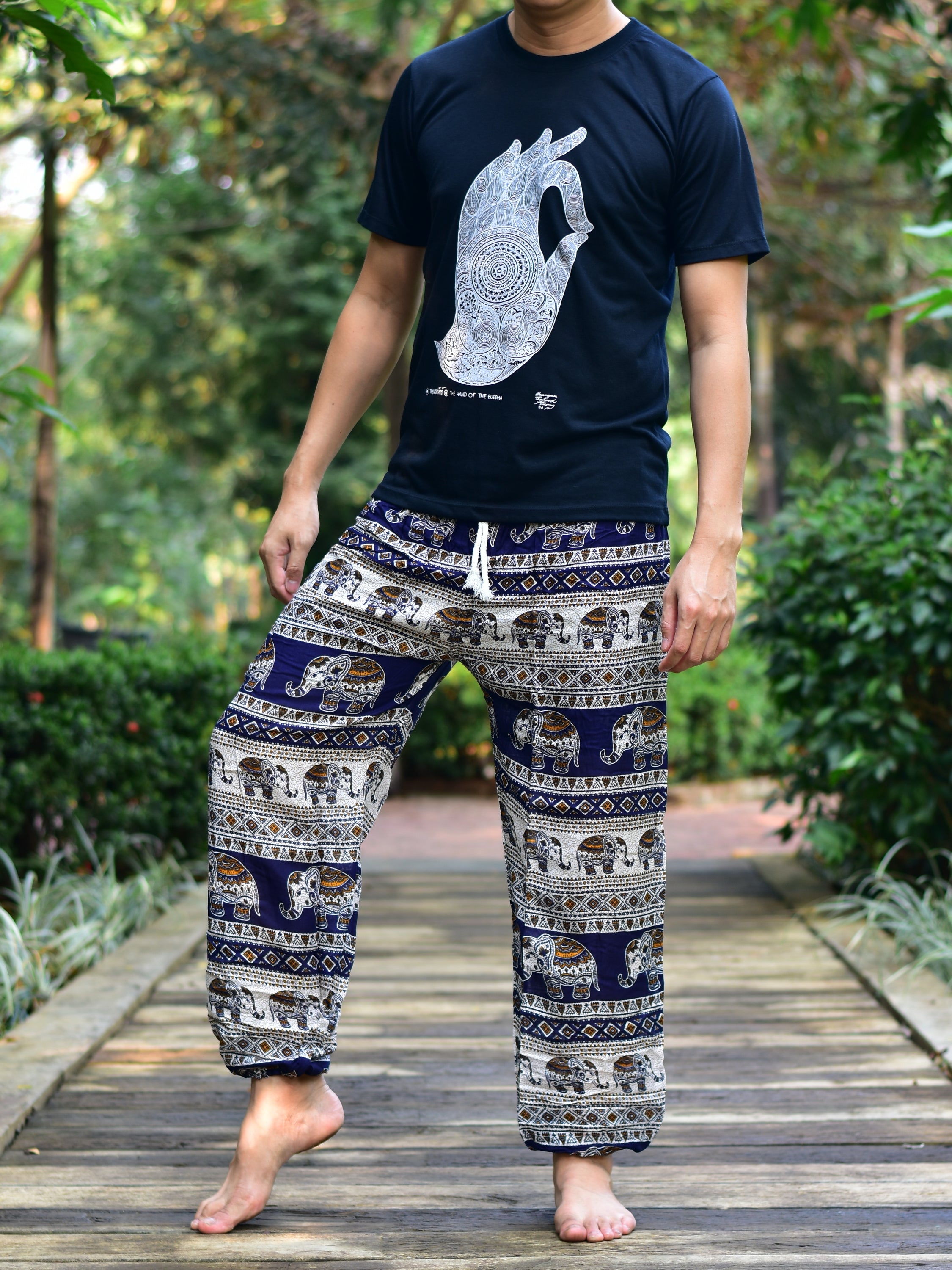 Bohotusk Men's Navy Blue Elephant Savannah Print Harem Pants with elasticated waist and ankles, featuring a unique elephant design.