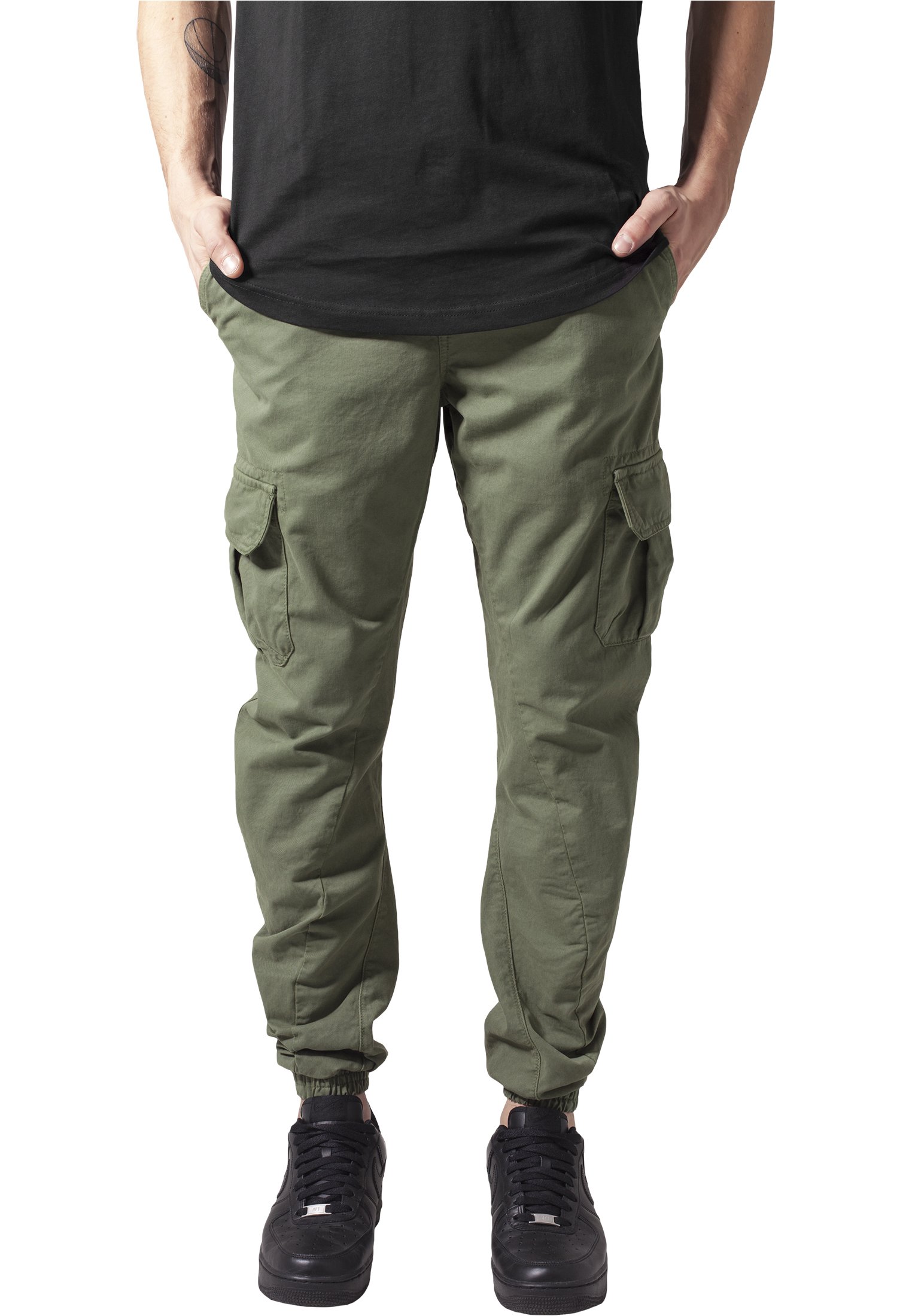 A pair of stylish cargo jogging pants made from 100% cotton, featuring multiple pockets and an elastic waistband for comfort.