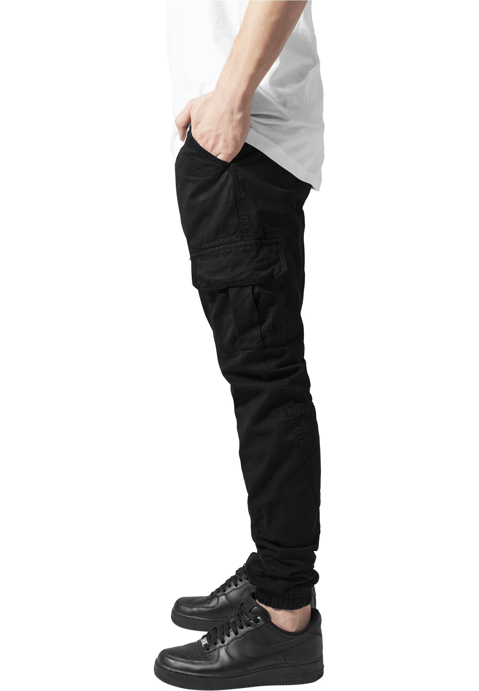 A pair of stylish cargo jogging pants made from 100% cotton, featuring multiple pockets and an elastic waistband for comfort.