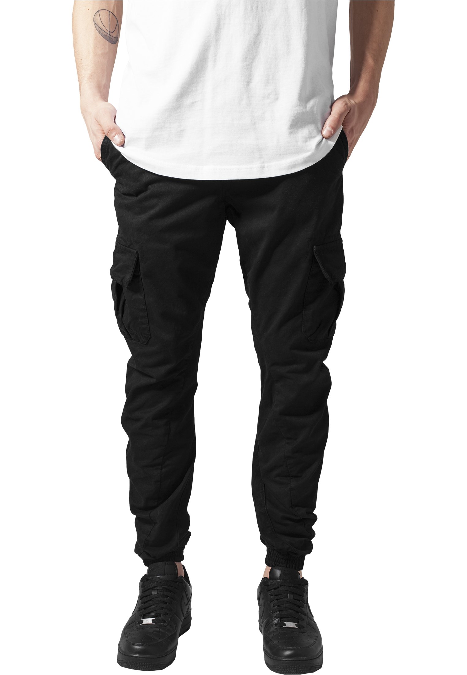 A pair of stylish cargo jogging pants made from 100% cotton, featuring multiple pockets and an elastic waistband for comfort.