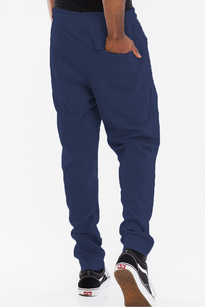 Heathered cotton sweats featuring an elastic waist, elastic ankle cuffs, and a zipper closure front pocket, perfect for casual wear.