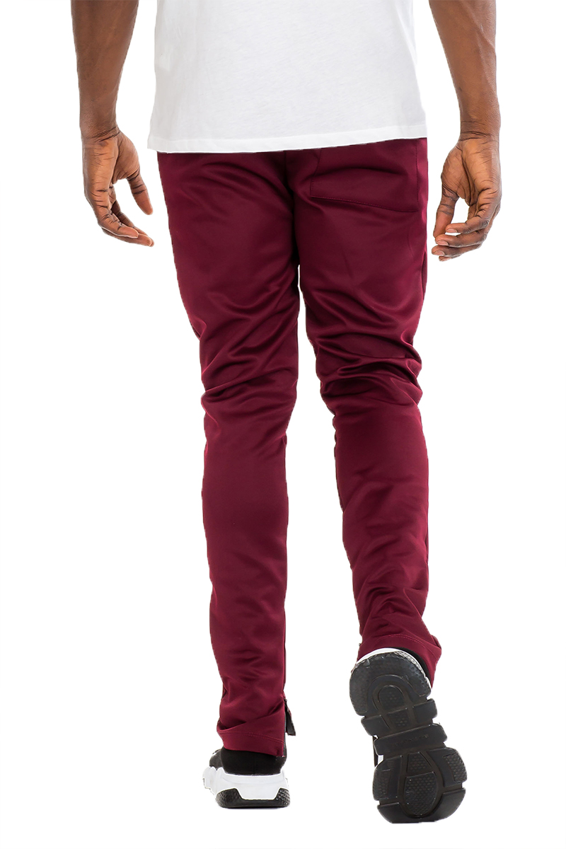 Burgundy Simple Track Pants featuring a skinny fit, elastic waist with drawstring, and hidden ankle zipper, perfect for workouts and casual wear.