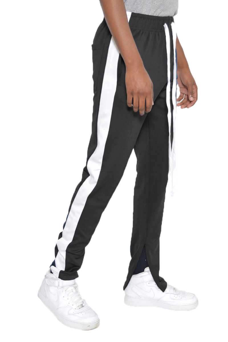 A pair of black and white slim fit track pants featuring hidden ankle zippers and standard pockets, designed for comfort and style.