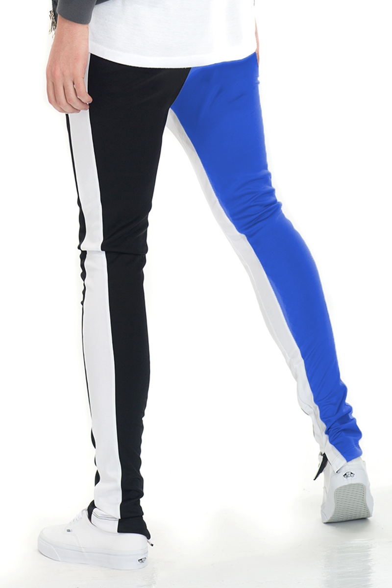 A pair of stylish Split Two Tone Track Pants featuring an elastic waist, hidden ankle zippers, and a modern color-block design.