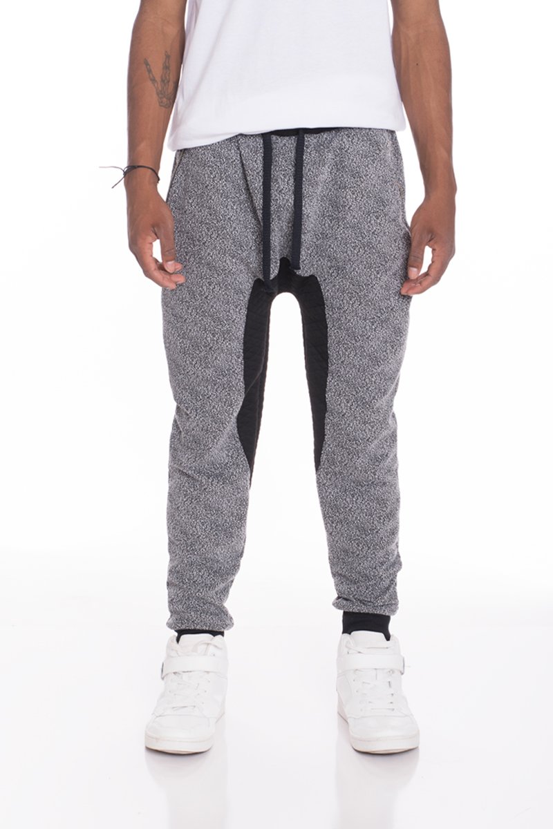 A pair of stylish Static Contrasted Joggers featuring an elastic waist and ankle cuffs, with two standard pockets and a single back pocket.