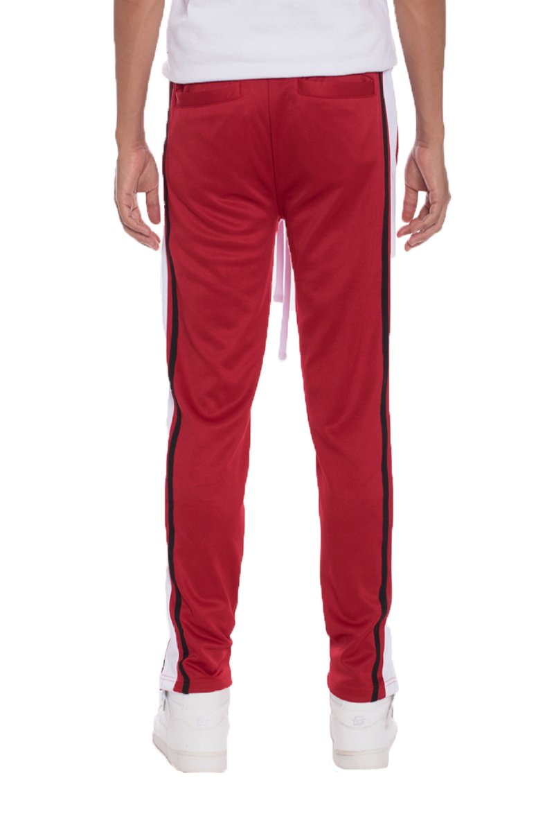 A pair of stylish Tricot Sweat Pants in a regular fit, featuring standard front and back pockets, and a hidden ankle zipper for added convenience.