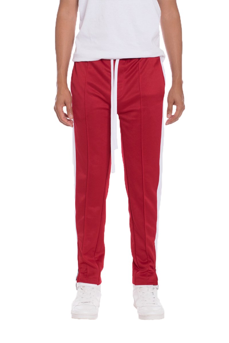 A pair of stylish Tricot Sweat Pants in a regular fit, featuring standard front and back pockets, and a hidden ankle zipper for added convenience.