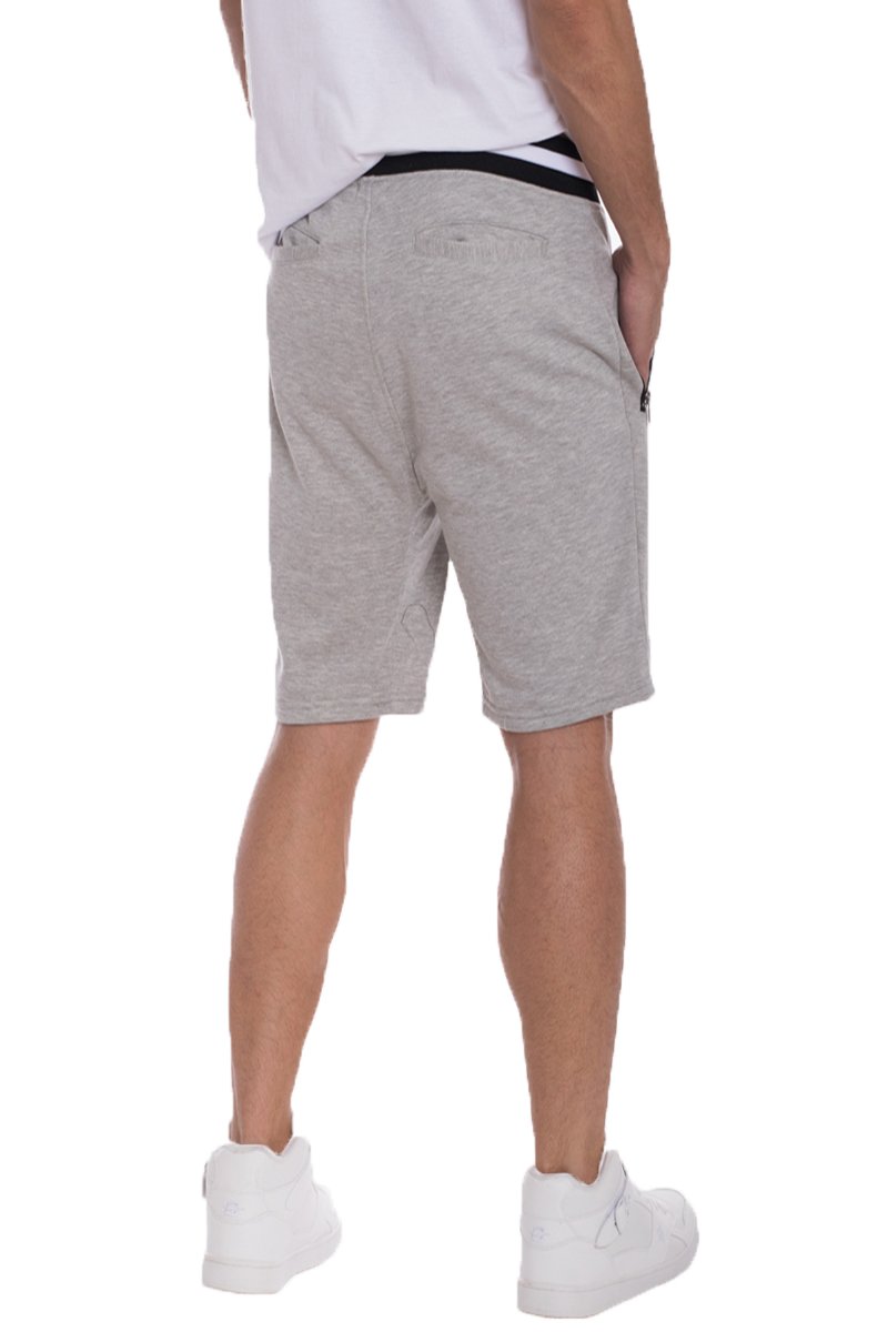 Brandon French Terry Shorts in Grey featuring striped ribbing, zipper pockets, and a black drawstring for a stylish and comfortable fit.