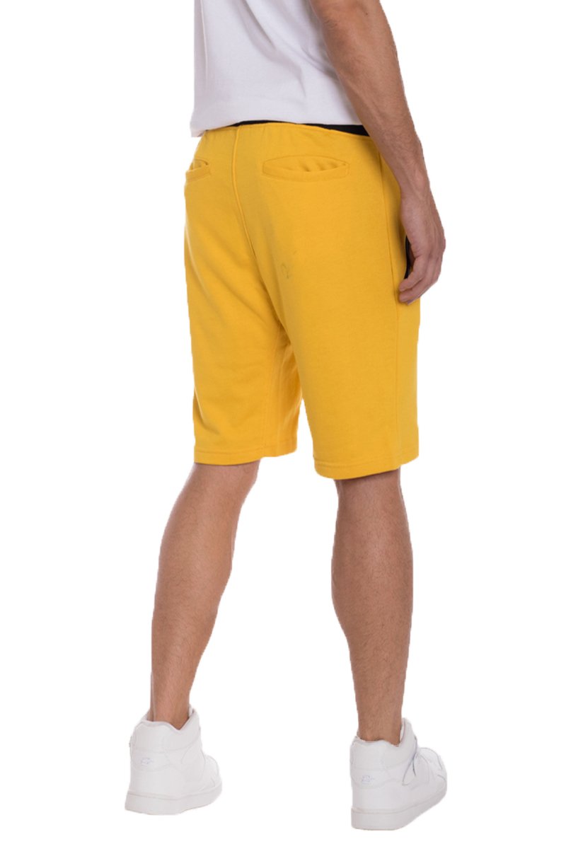 A pair of stylish French Terry Shorts featuring an elastic waist and drawstring, perfect for casual wear.