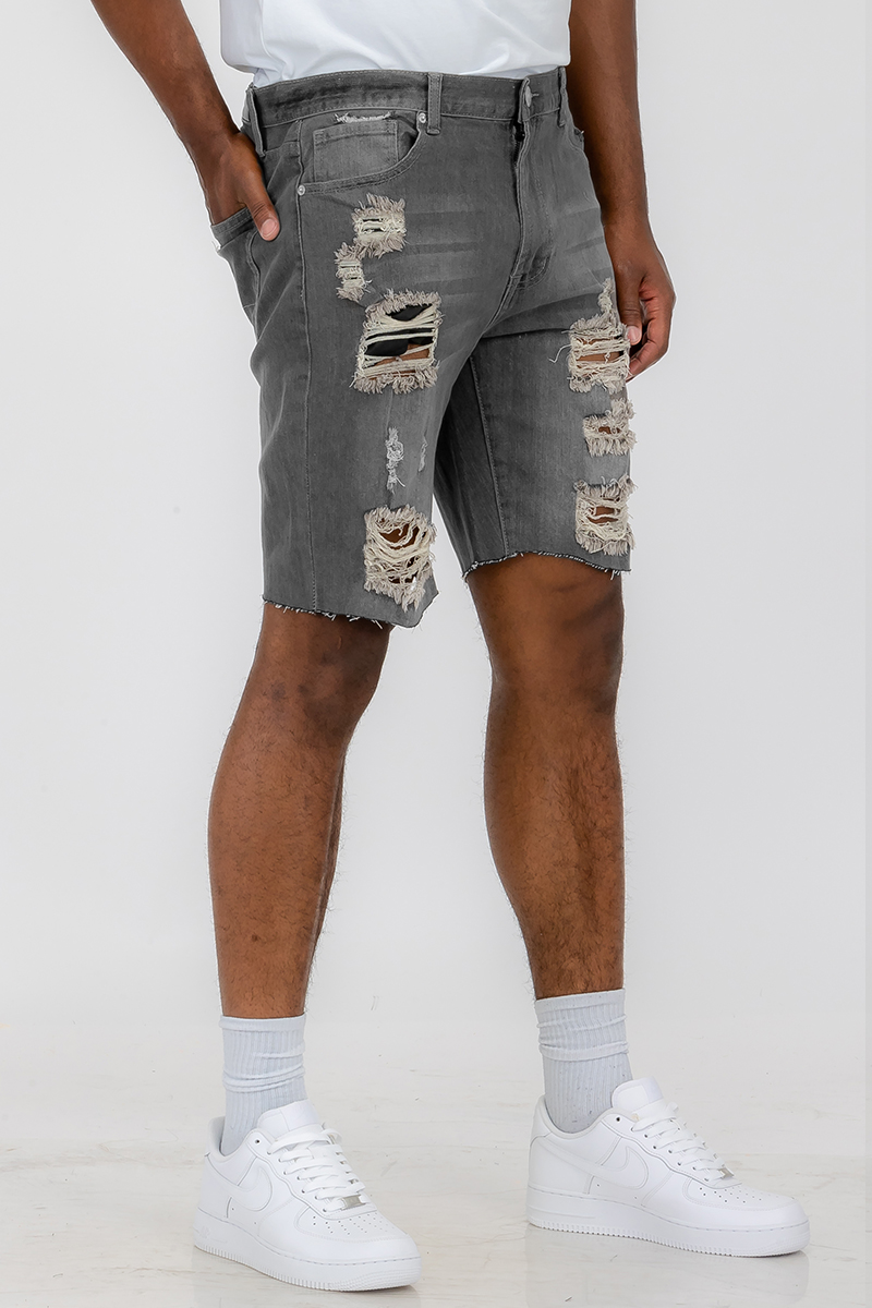 Mens Distressed Denim Shorts featuring a stylish distressed design, above-the-knee fit, and classic button closure.