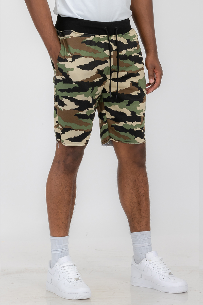 A pair of Raw Cut City Sweat Shorts featuring a raw cut design, elastic waist with drawstring, and a single back pocket, made from a cotton-polyester blend.