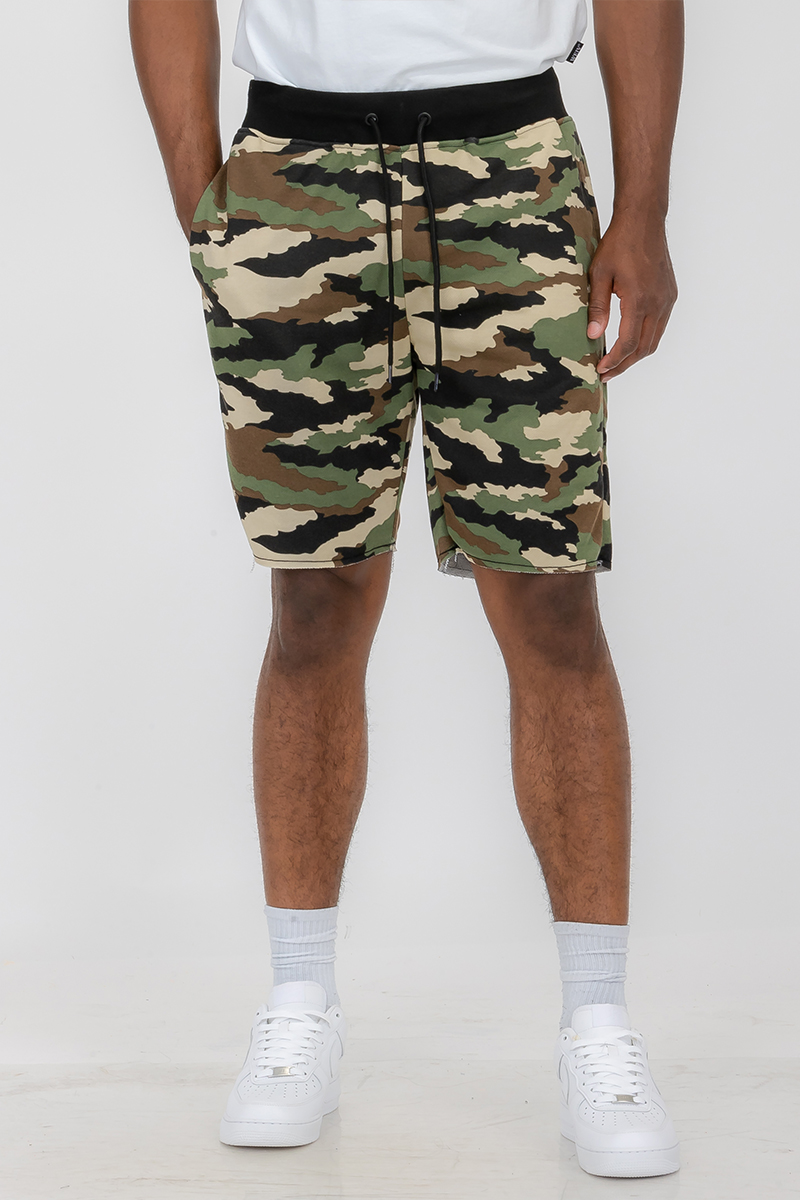 A pair of Raw Cut City Sweat Shorts featuring a raw cut design, elastic waist with drawstring, and a single back pocket, made from a cotton-polyester blend.