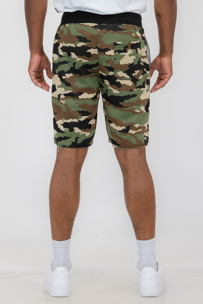 A pair of Raw Cut City Sweat Shorts featuring a raw cut design, elastic waist with drawstring, and a single back pocket, made from a cotton-polyester blend.