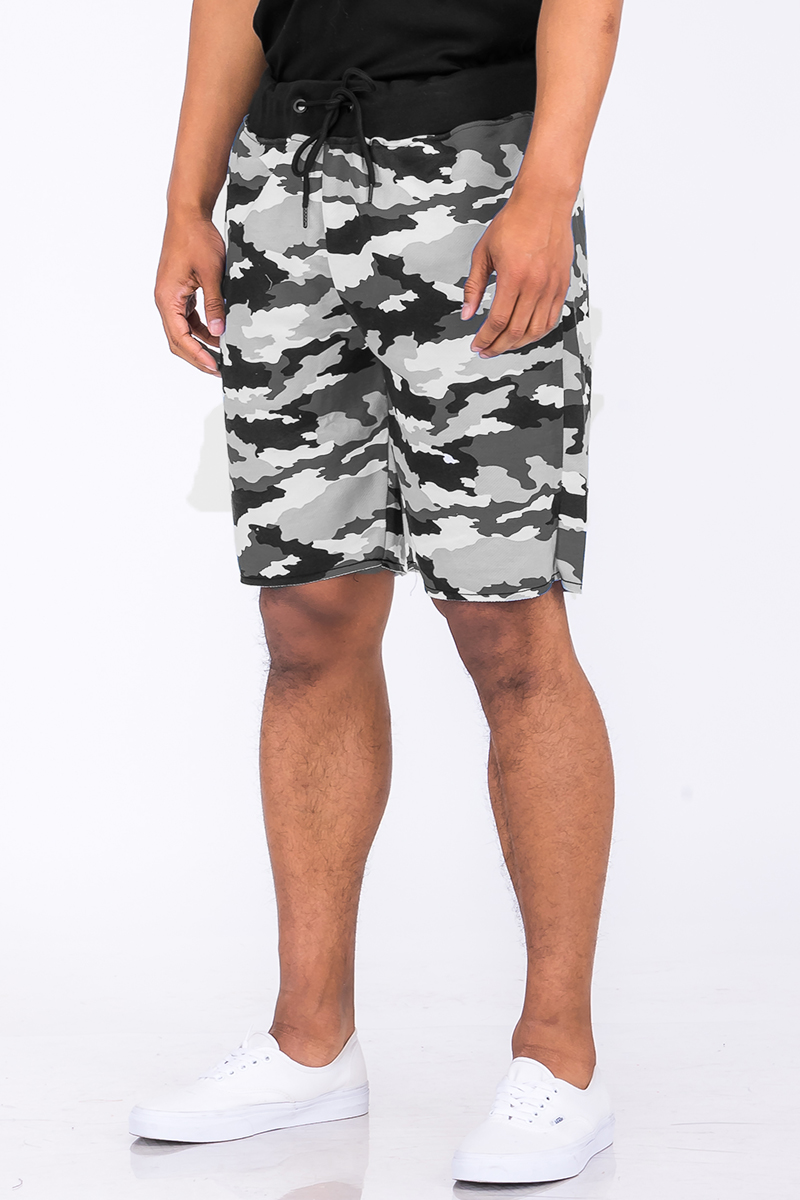 A pair of Raw Cut City Sweat Shorts featuring a raw cut design, elastic waist with drawstring, and a single back pocket, made from a cotton-polyester blend.