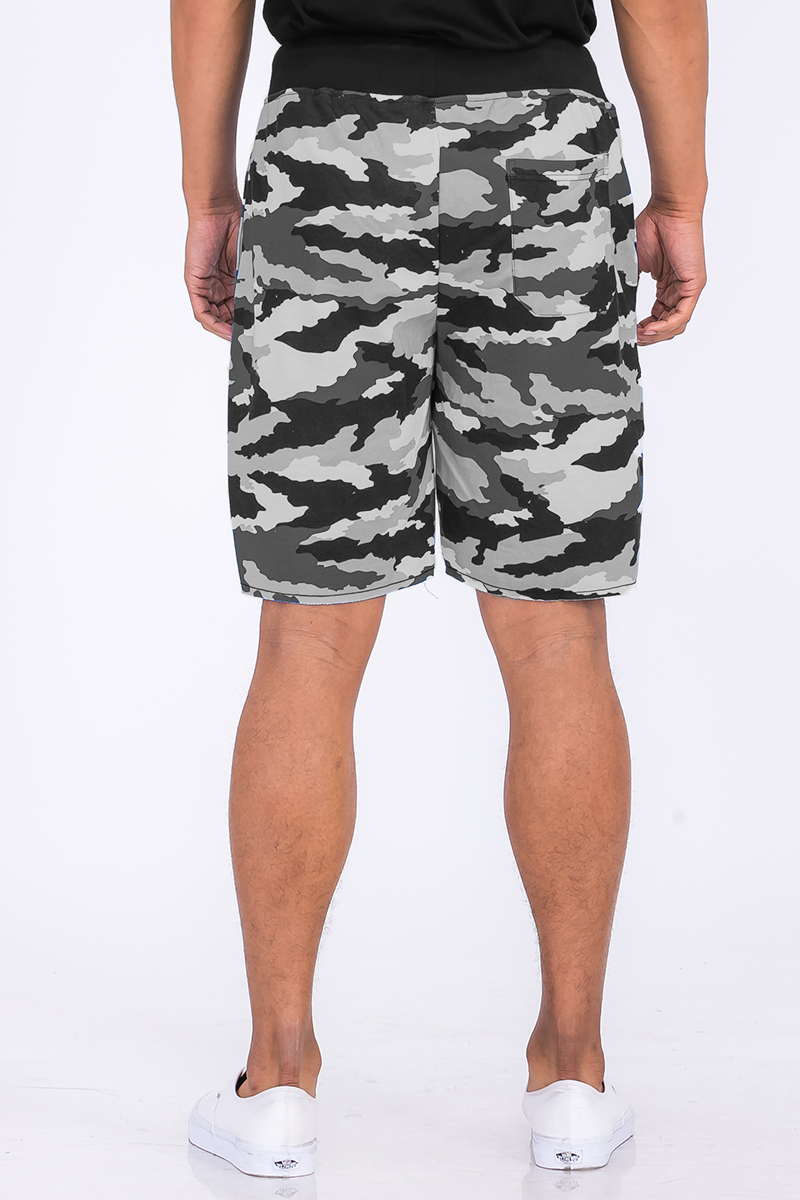 A pair of Raw Cut City Sweat Shorts featuring a raw cut design, elastic waist with drawstring, and a single back pocket, made from a cotton-polyester blend.