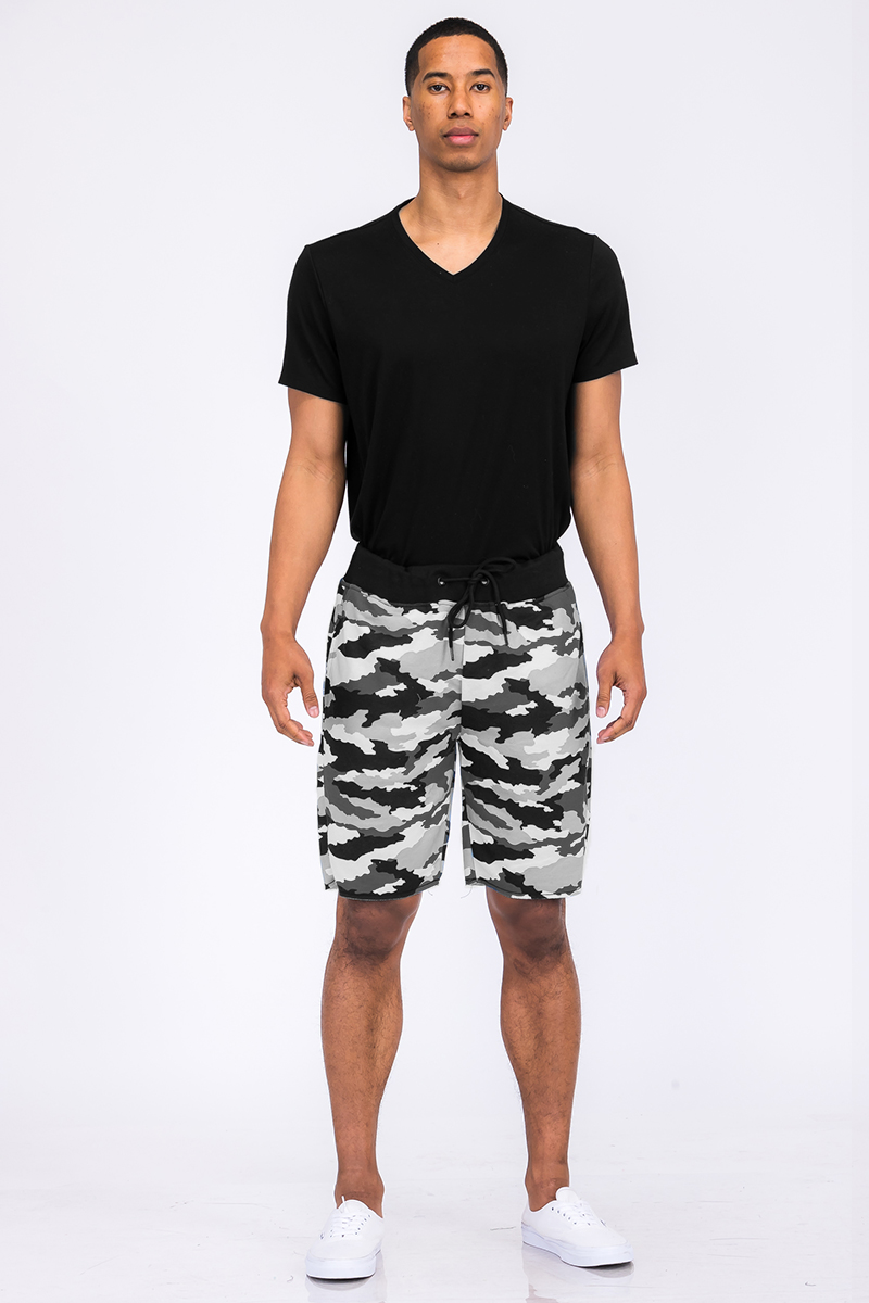 A pair of Raw Cut City Sweat Shorts featuring a raw cut design, elastic waist with drawstring, and a single back pocket, made from a cotton-polyester blend.