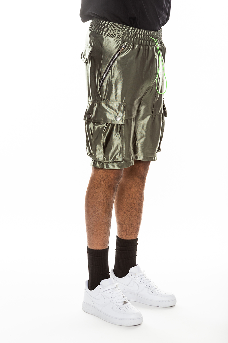 A pair of stylish satin cargo shorts featuring an elastic waist, drawstring, and multiple pockets in a sleek design.