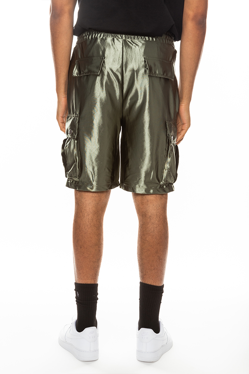 A pair of stylish satin cargo shorts featuring an elastic waist, drawstring, and multiple pockets in a sleek design.