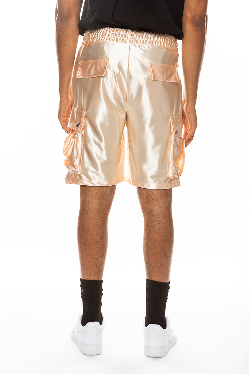 A pair of stylish satin cargo shorts featuring an elastic waist, drawstring, and multiple pockets in a sleek design.