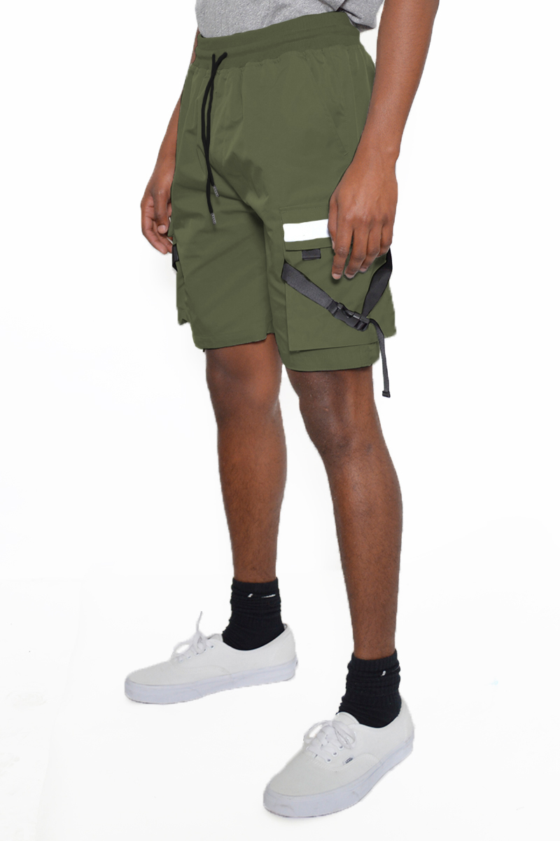 A pair of tactical shorts featuring reflective tape, cargo pockets, and an elastic waist with drawstring, ideal for outdoor activities.