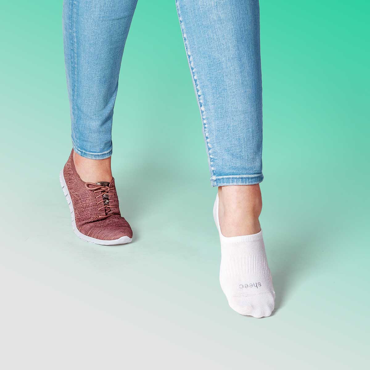 A pair of white Active High-cut Super Soft Modal Casual No Show Socks, showcasing their high-cut design and soft fabric, perfect for active wear.