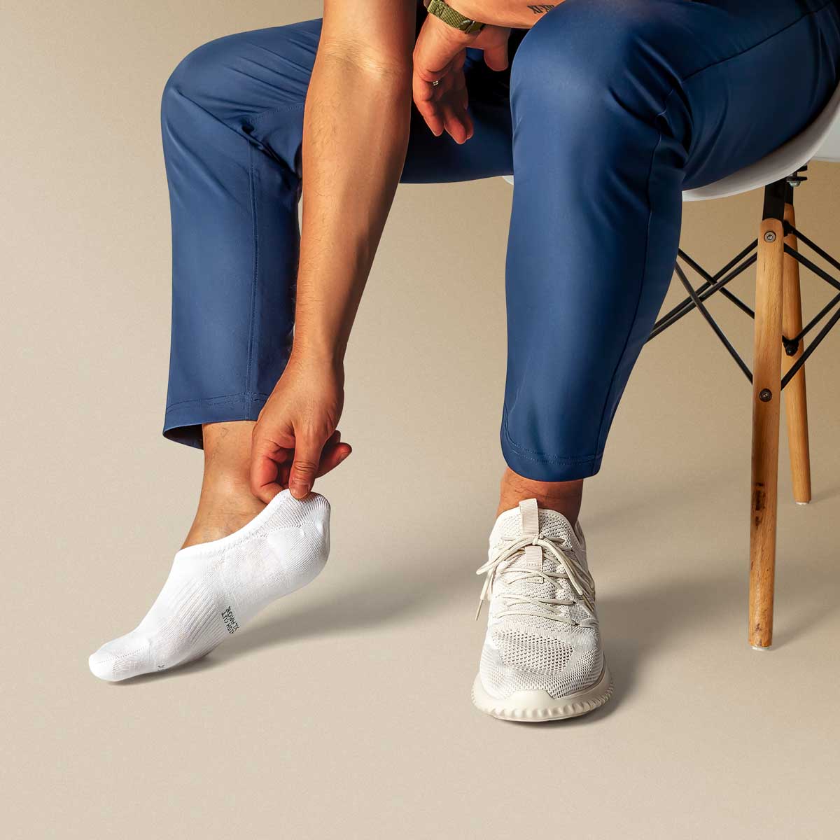 A pair of white Active High-cut Super Soft Modal Casual No Show Socks, showcasing their high-cut design and soft fabric, perfect for active wear.