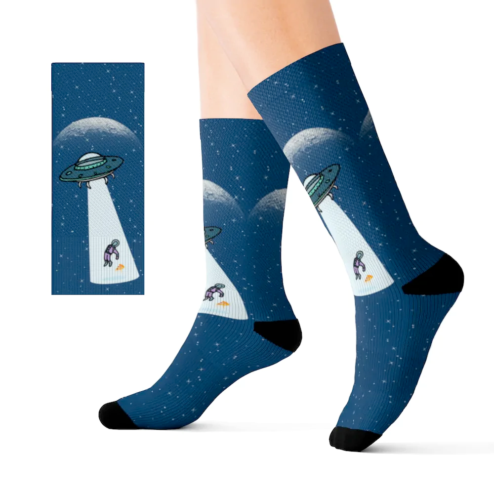 A pair of novelty socks featuring aliens and a slice of pizza, showcasing vibrant colors and a fun design.