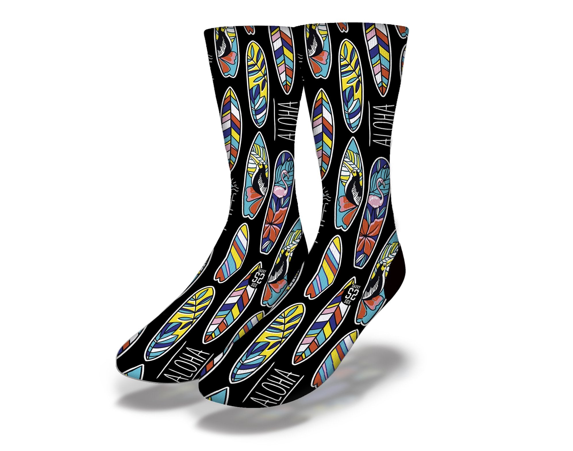 ALOHA TROPICAL SURFBOARDS Fun Surfing Socks featuring Polynesian birds, flamingos, and flowers on a black background, perfect for beach lovers.