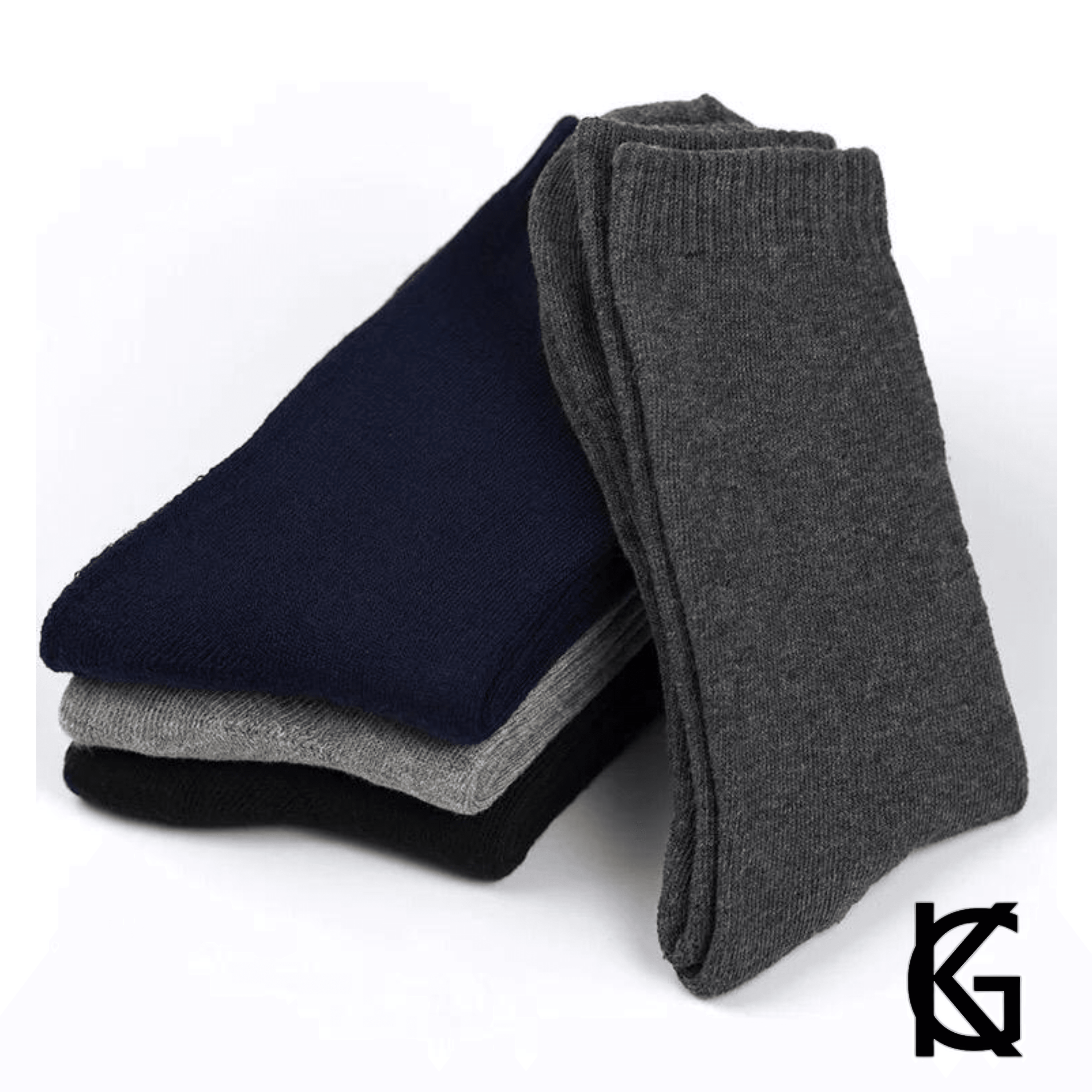 A pack of GK Cotton Blend Men's Dress Socks in black, gray, and blue, showcasing their comfortable and stylish design.