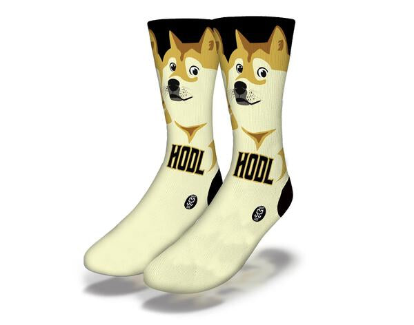 A pair of DOGECOIN HODL Funny Crypto Meme Socks featuring a playful Shiba Inu design, perfect for cryptocurrency enthusiasts.