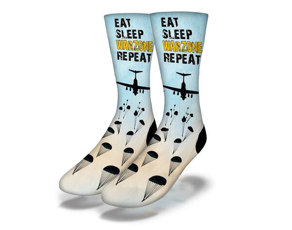 Blue Eat Sleep Warzone Repeat Socks featuring a fun gaming slogan, perfect for gamers.