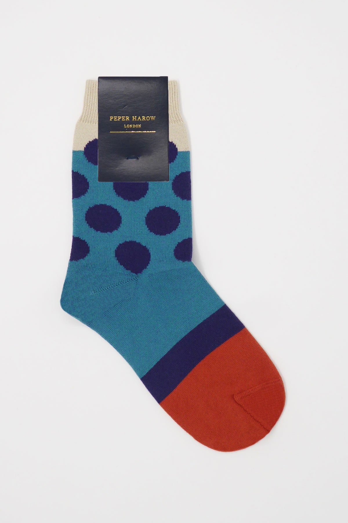 Eleanor Women's Socks in teal with navy polka dots and burnt orange toe, showcasing luxurious Supima cotton material.