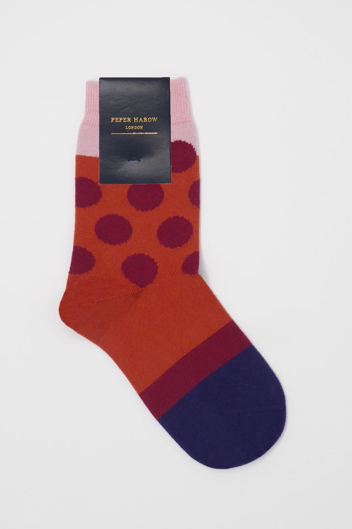 Eleanor Women's Socks in terracotta with wine polka dots and navy toe, showcasing luxurious Supima cotton.