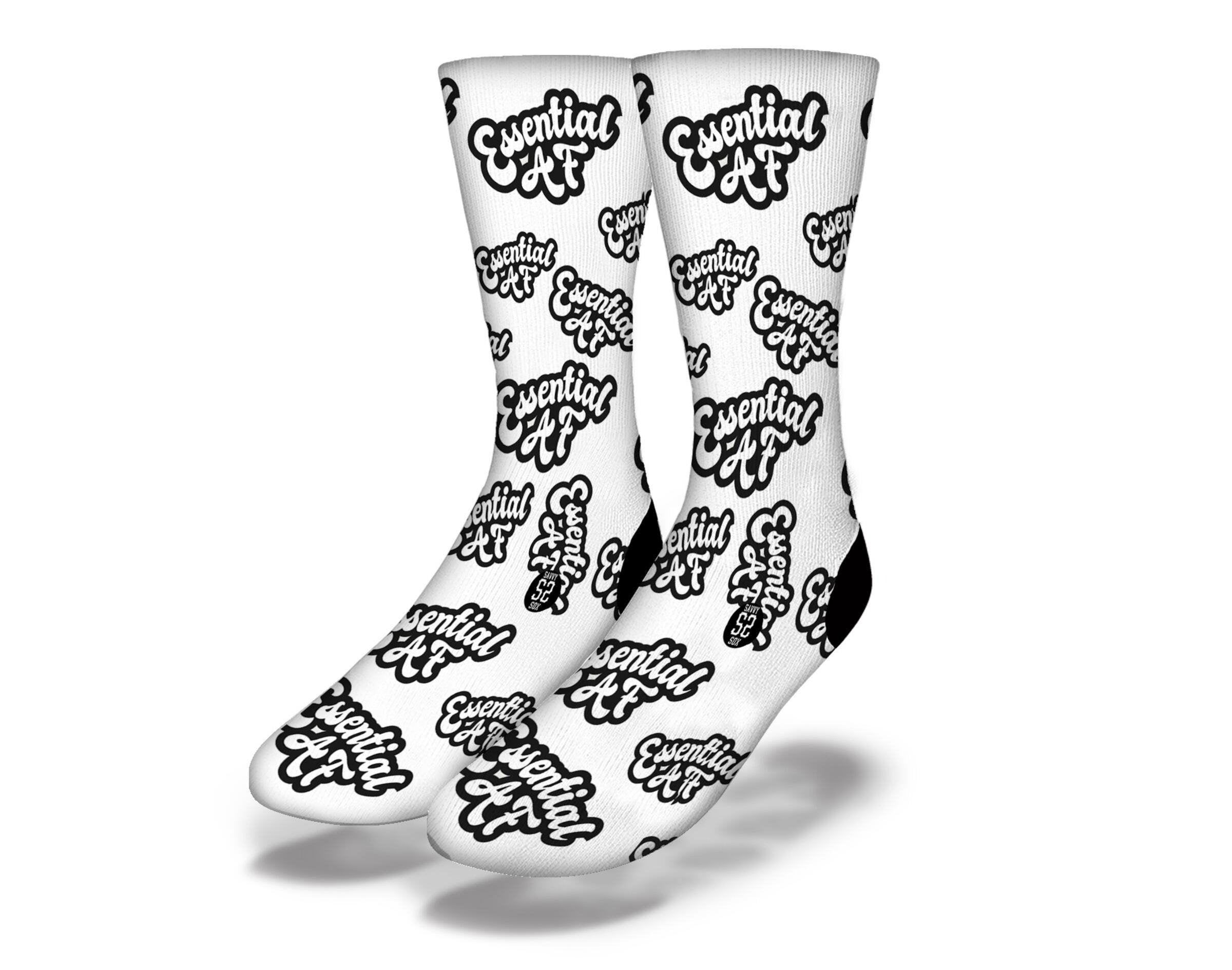 A pair of Essential AF Socks in white, showcasing their soft fabric and stylish design.