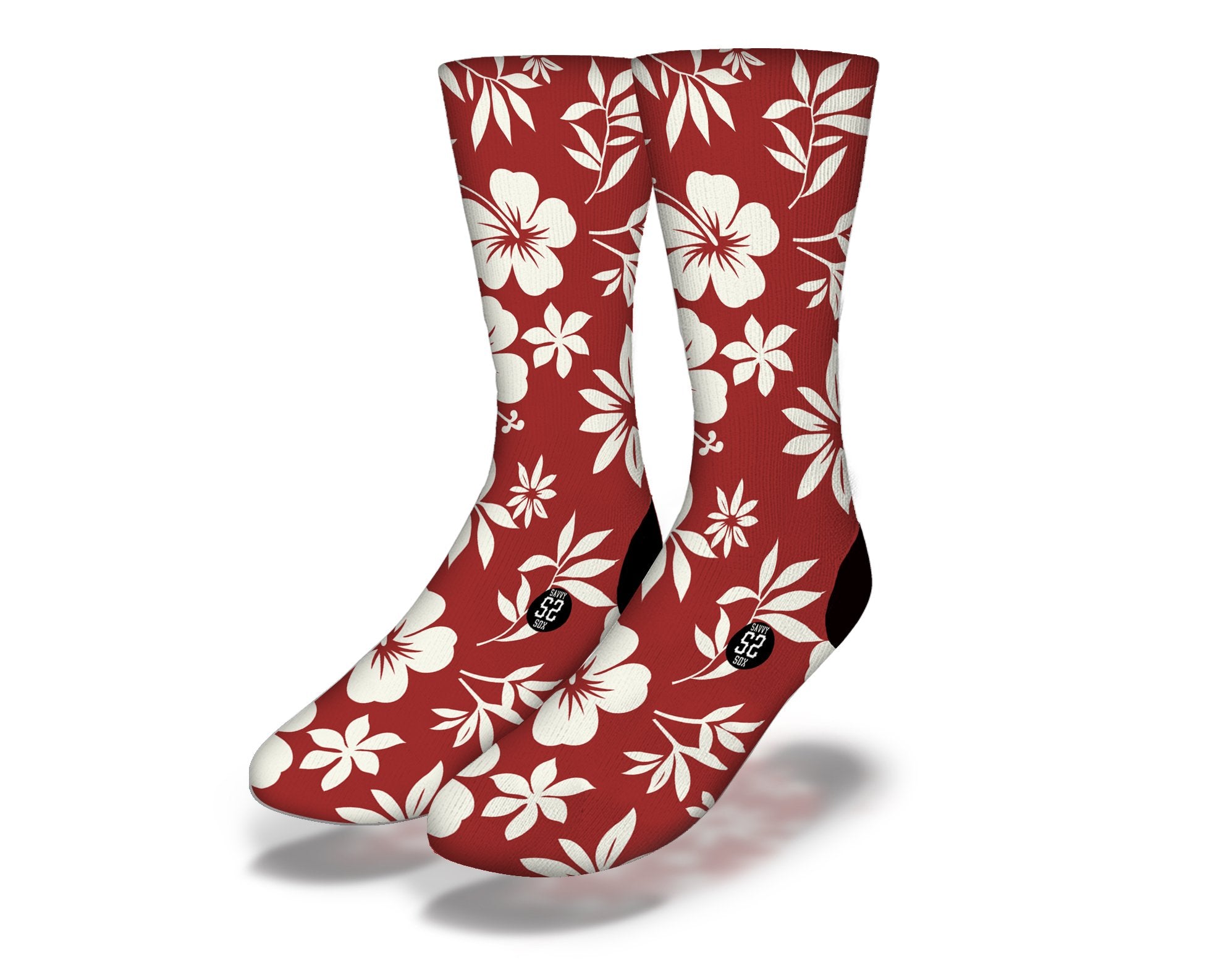 A pair of vibrant red socks featuring Hawaiian hibiscus and plumeria flowers, perfect for beach lovers and luau parties.