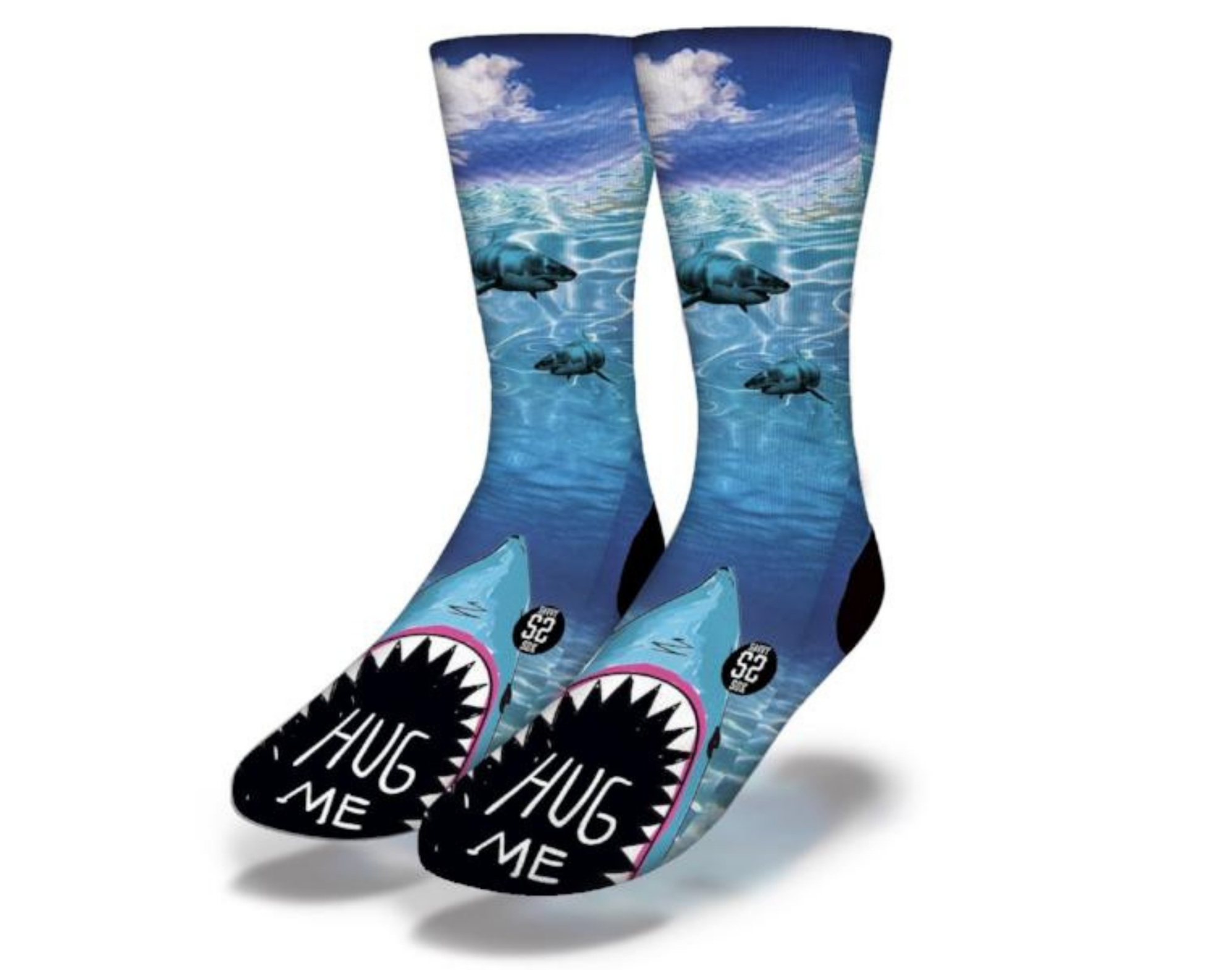 A pair of HUG ME Funny Shark Socks featuring a playful shark design with the text 'Pleased to eat you!' in vibrant colors.