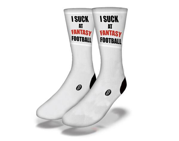 A pair of I SUCK AT FANTASY FOOTBALL funny socks featuring bold text, perfect for sports fans and casual wear.