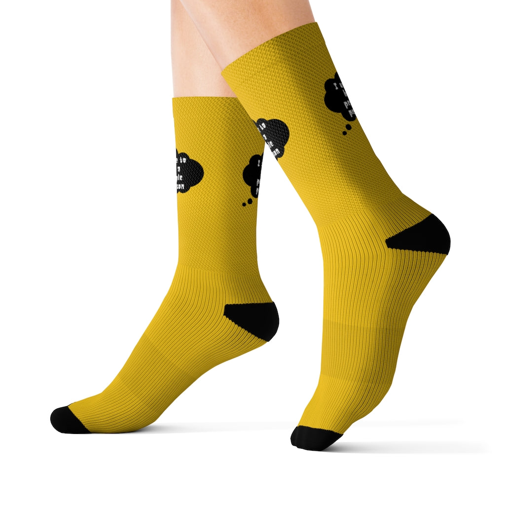 A pair of I Use To Be a People Person funny novelty socks featuring a humorous print, designed for comfort and style.