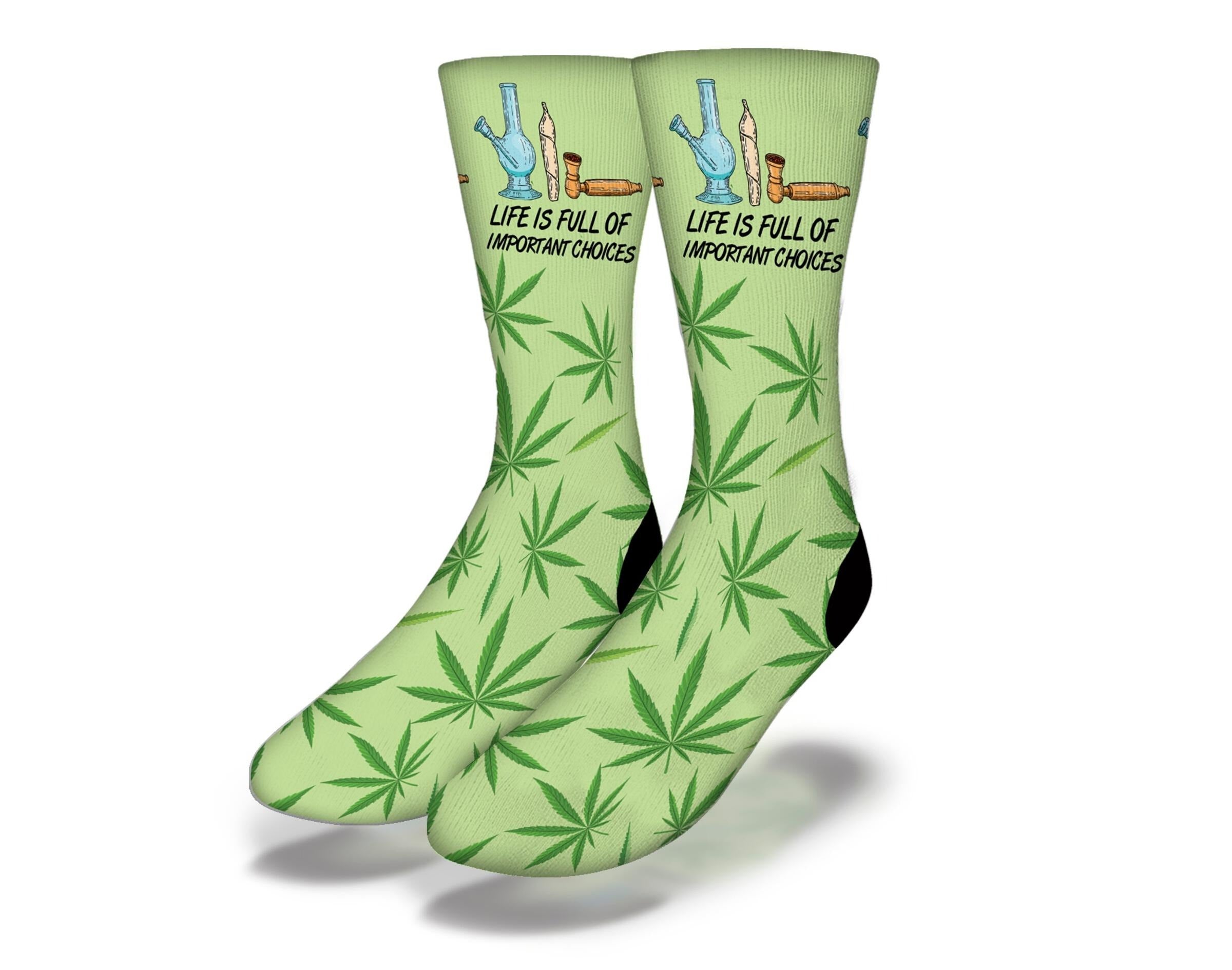 A pair of colorful funny weed socks featuring marijuana pot leaf designs and humorous phrases, perfect for stoners.