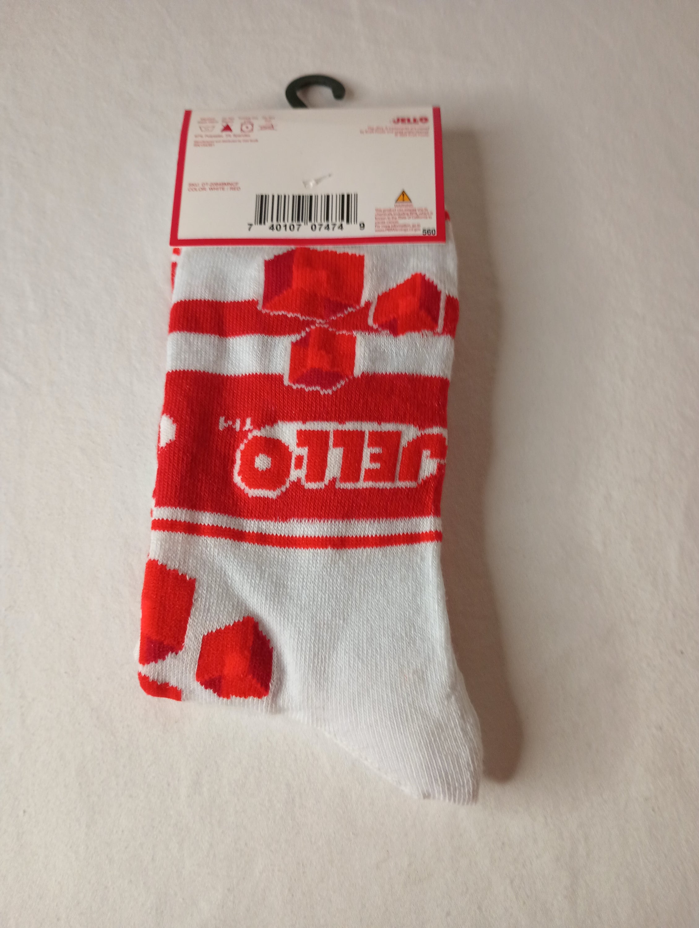 A pair of vibrant red and white Jell-O Crew Socks designed for men, showcasing a playful dessert-inspired pattern.