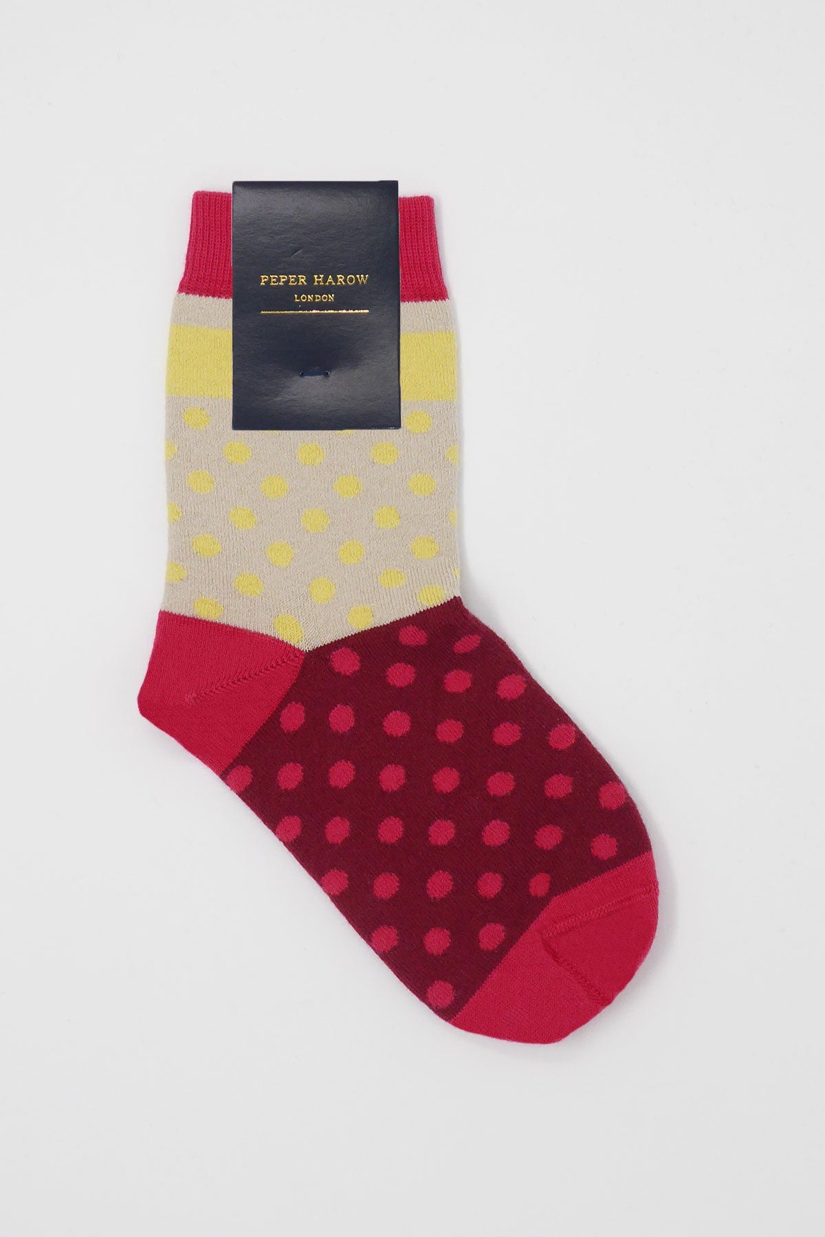 Katherine Women's Socks in Wine featuring vibrant yellow and pink polka dots on a rich wine background, made from luxurious Supima cotton.