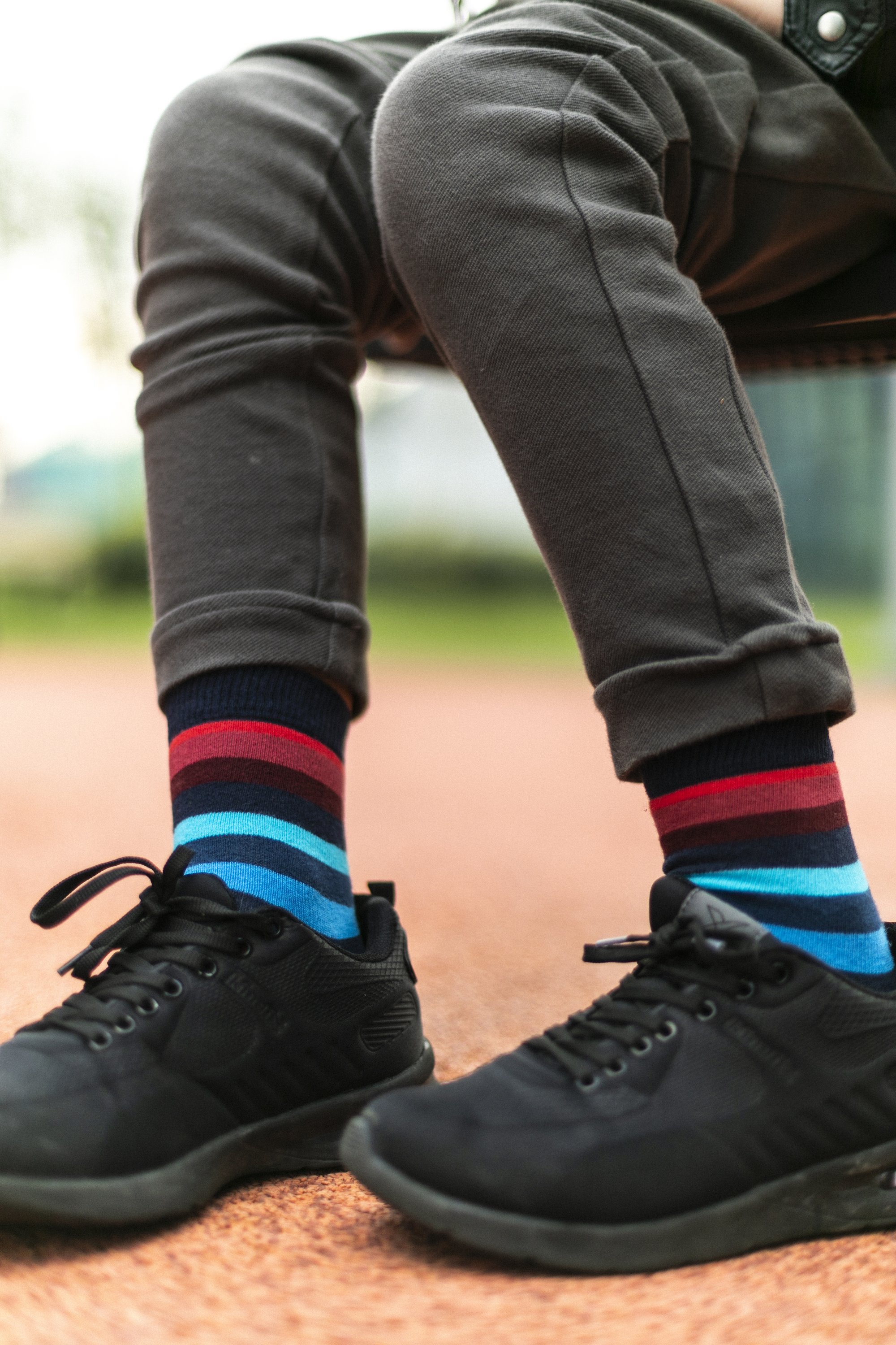 Kids Black Grape Stripe Socks featuring a colorful design with black and grape stripes, made from soft cotton for comfort.