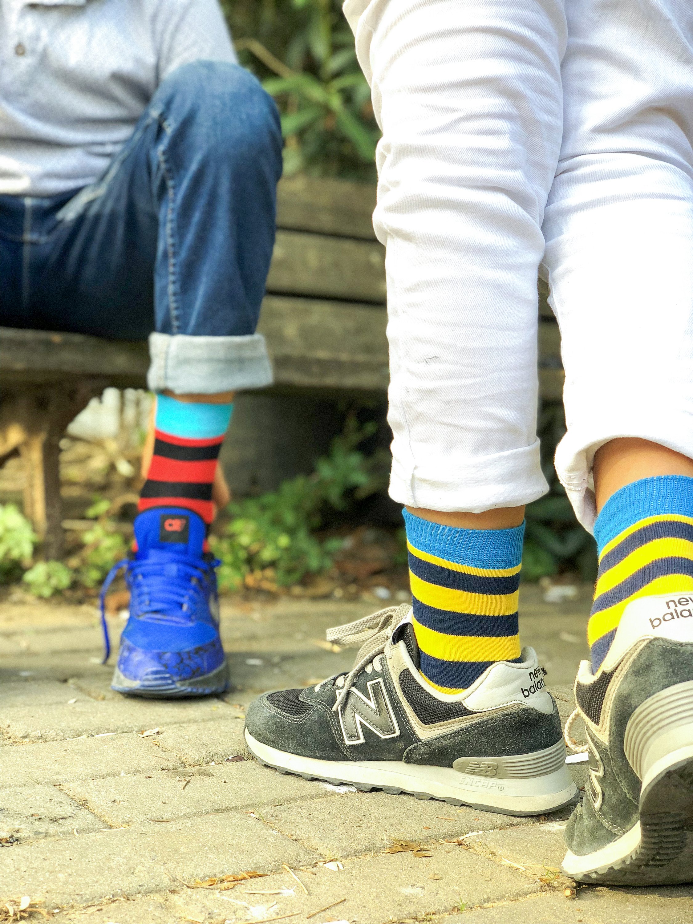 Kids Blue Canary Stripe Socks featuring vibrant blue and yellow stripes, made from soft Turkish cotton for comfort and style.