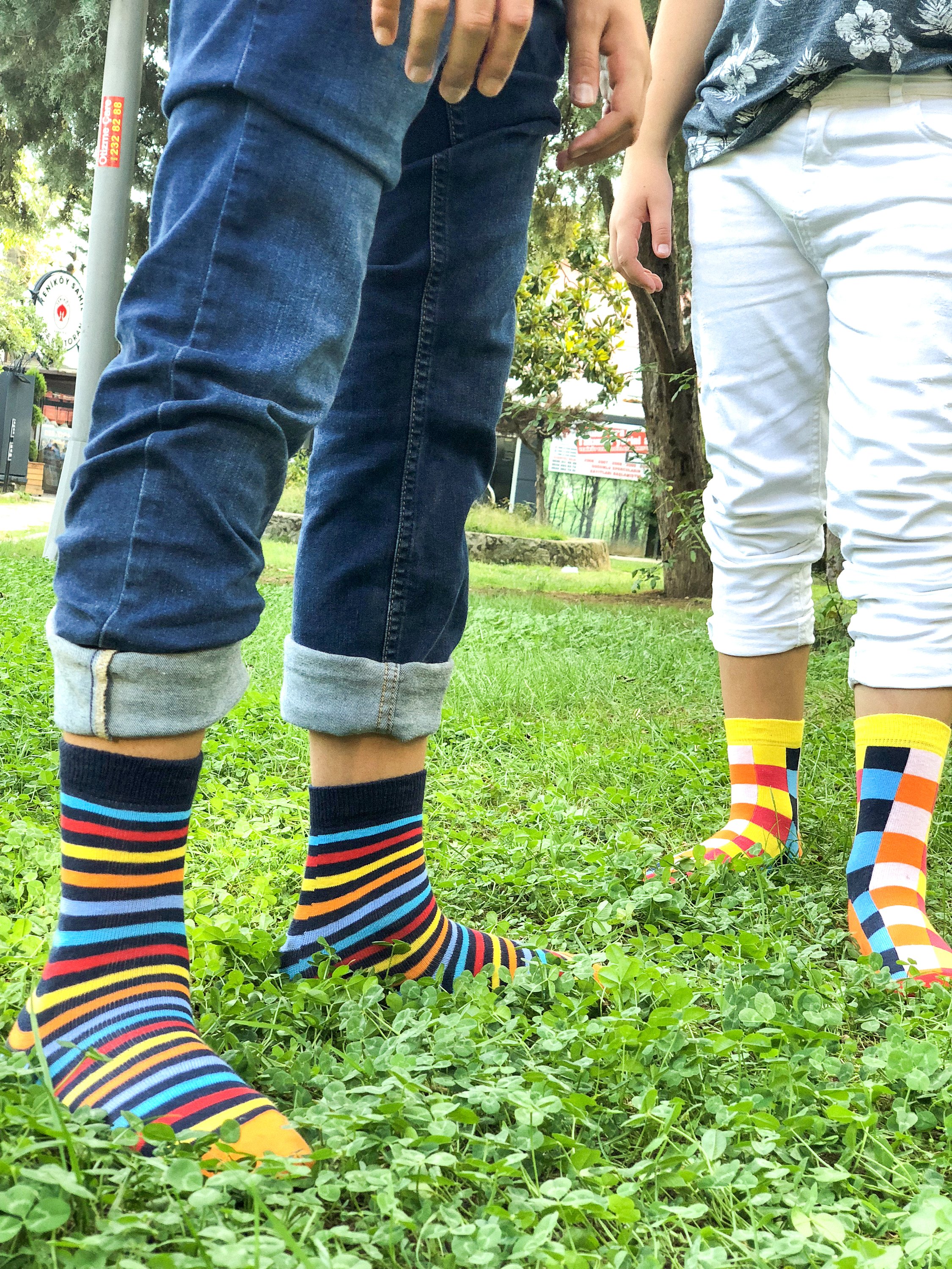 A pair of Kids Canary Square Socks featuring colorful patterns and soft cotton material, perfect for children's fashion.