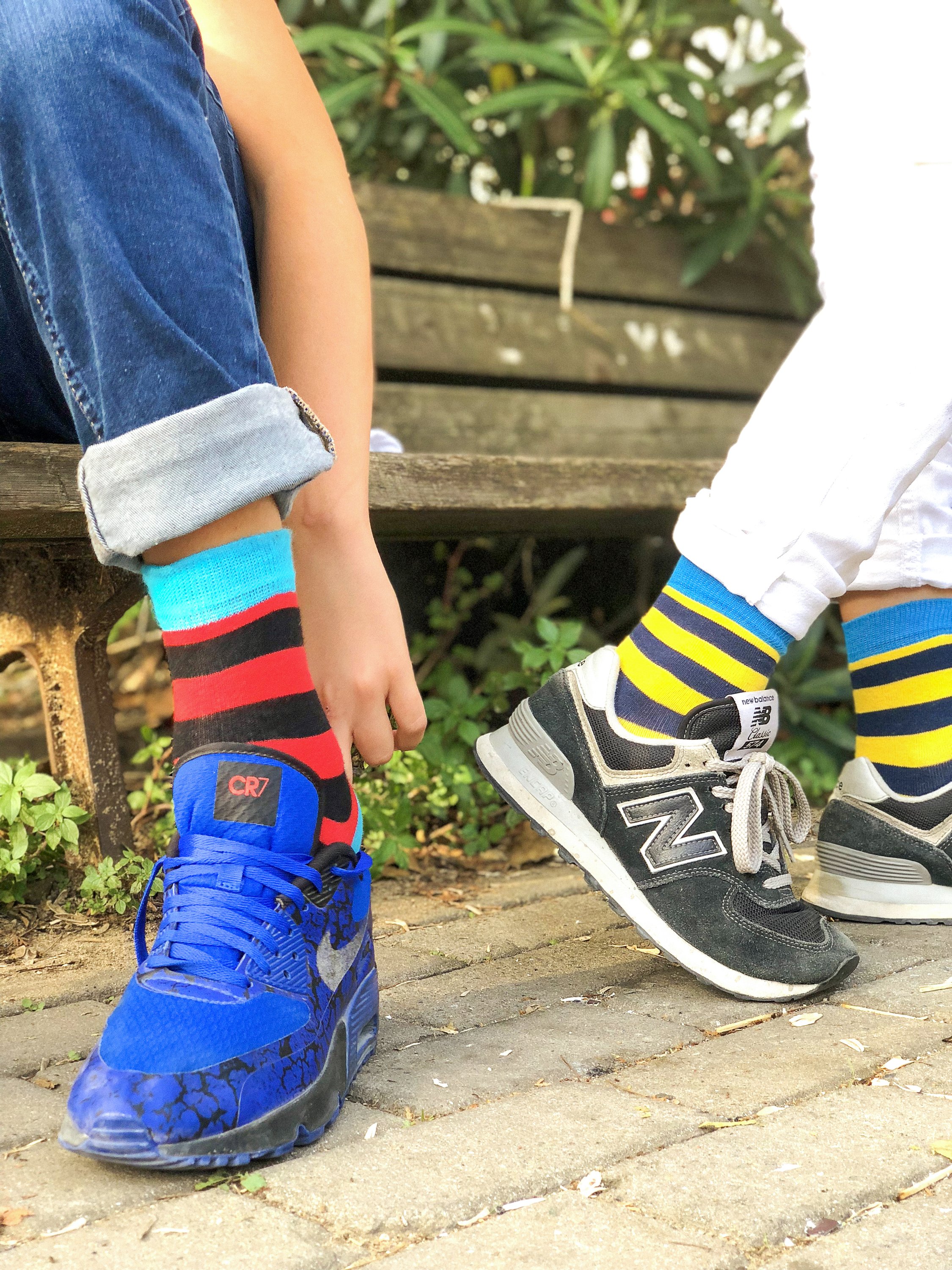 Colorful Kids Trendy Stripes Socks displayed in a playful arrangement, showcasing their vibrant patterns and soft texture.