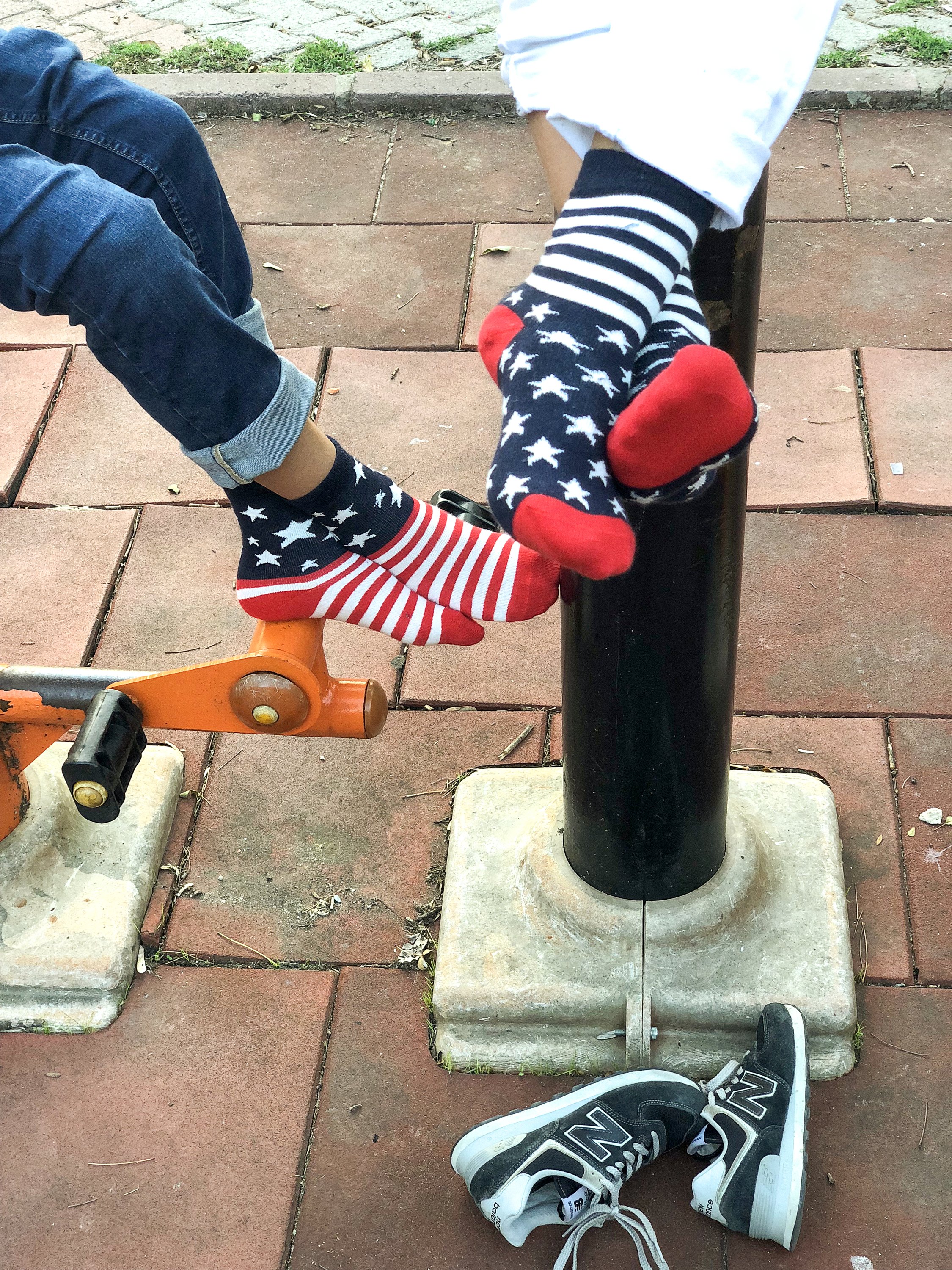 Kids USA Flag Stars Socks featuring vibrant colors and a fun design, perfect for adding style to any outfit.