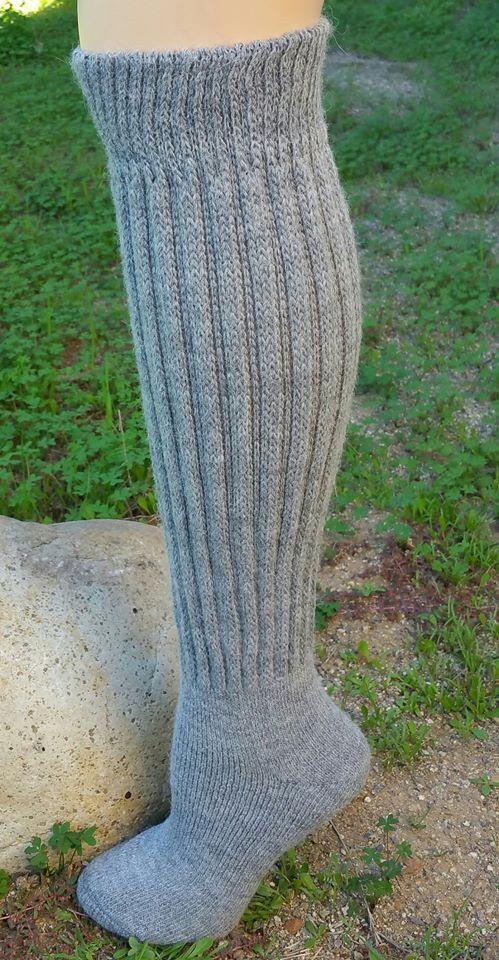 Knee-Hi Alpaca Socks in various colors, showcasing their soft texture and knee-high design, perfect for comfort and warmth.