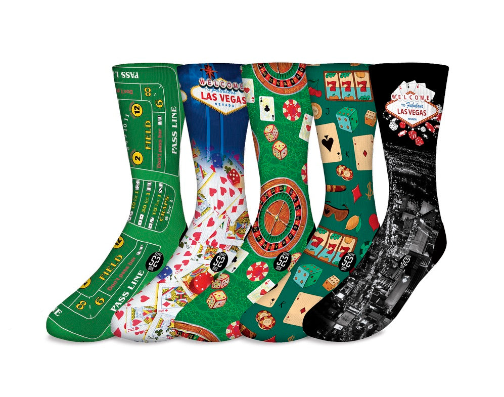 A colorful display of five Las Vegas themed socks featuring iconic symbols and designs representing the vibrant city.